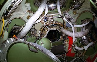 Interior view of the Mir Space Station central core node and its multiple docking ports. 